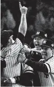  ?? Susan Walsh / Associated Press ?? The Yankees celebrate their 1996 title over the Braves for their first title since 1978.