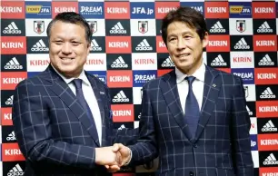  ?? Reuters ?? Japan’s new head coach Akira Nishino (right) and Japan Football Associatio­n President Kozo Tashima at a news conference. —