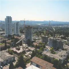  ?? DARRYL DYCK / THE CANADIAN PRESS FILES ?? With mortgage rates still high, some condo developers in the Vancouver area are struggling to generate enough early interest in projects to get them built.