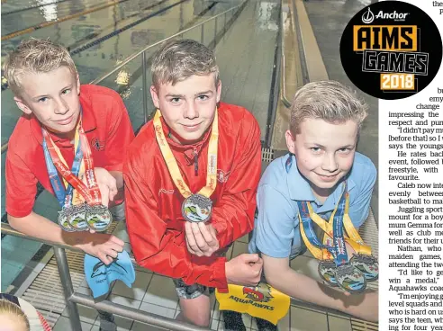  ?? Photo / Paul Taylor ?? Caleb Carlisle (left), 13, Nathan Stone, 13, Ryan Hurley, 12, and Olivia Wellington, 13 (inset), are back from the Aims Games in the Bay of Plenty with their medals.
