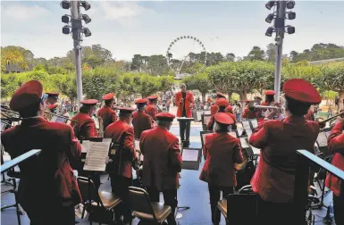  ?? Photos by Carlos Avila Gonzalez / The Chronicle ?? Bob Calonico leads the Golden Gate Park Band in a resumption of free summer concerts in San Francisco.