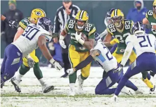  ?? DAN POWERS / USA TODAY NETWORK-WISCONSIN ?? Packers running back AJ Dillon averaged 5.3 yards a carry for the Packers in limited action.