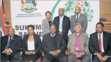  ??  ?? THE COMMISSION OF INQUIRY: Seated from left: Nhlanhla Ngidi the director-general of the province, advocate Thandi Norman, Premier Zweli Mkhize, Reverend Rubin Phillip, Thandanani Mthembu; standing from left, Bongekile Zulu, Dumisani Xaba and Sithembiso...