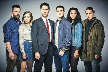  ?? — NETFLIX ?? Travelers stars, from left, Canadians Patrick Gilmore, Mackenzie Porter, Eric McCormack, Jared Paul Abrahamson, Nesta Marlee Cooper and Reilly Dolman.