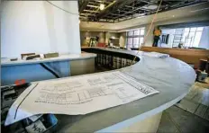  ?? Andrew Rush/Post-Gazette ?? Social Circle Bistro, the bar and restaurant in the lobby of the Cambria hotel & suites next to PPG Paints Arena, is in the process of remodeling.