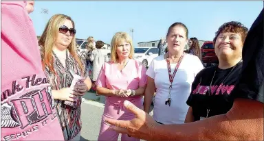  ?? TIMES photograph by Annette Beard ?? Cancer survivors and Pea Ridge School staff LaRay Thetford, Debbie Klotz, Jeanie Marlow and Dawnitta Henson were recognized at a special Pink Heals event recently at Pea Ridge schools.