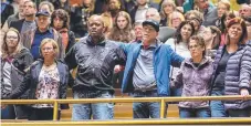  ?? Picture: AP ?? Attendees link arms at the interfaith memorial service to the 11 people killed at a Pittsburgh synagogue.