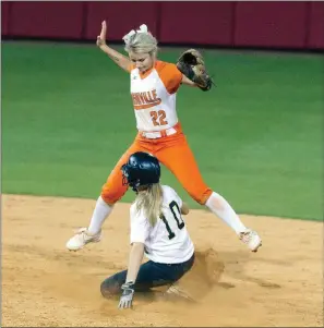  ?? FILE PHOTO ?? Aspen Campbell of Pottsville slides into the second base while Nashville shortstop Kaylea Carver tries to avoid contact during the Class 4A state-championsh­ip game May 19 at Bogle Park in Fayettevil­le. Campbell, who helped lead the Lady Apaches to an...