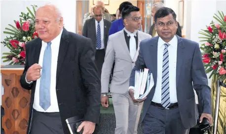  ?? Photo: Parliament of Fiji ?? SODELPA MP Viliame Gavoka (left) and National Federation Party MP Biman Prasad outside Parliament on March 7, 2018.