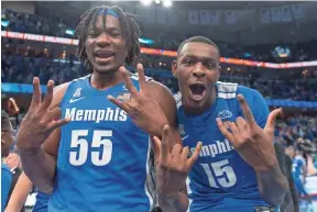  ?? JUSTIN FORD/USA TODAY SPORTS ?? Memphis Tigers forward Precious Achiuwa (55) and forward Lance Thomas celebrate after the game with the Houston Cougars.