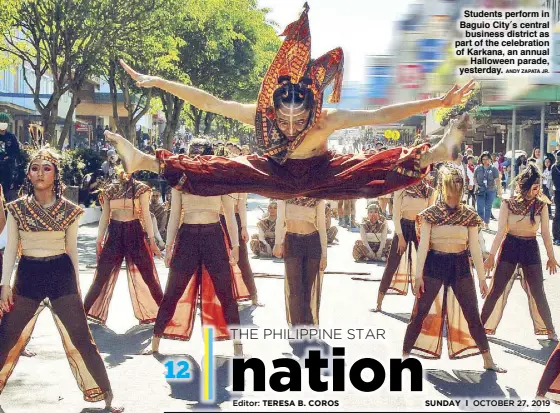  ?? ANDY ZAPATA JR. ?? Students perform in Baguio City’s central business district as part of the celebratio­n of Karkana, an annual Halloween parade, yesterday.