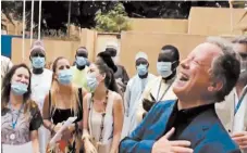  ?? WORLD FOOD PROGRAM ?? In this video still taken Friday, World Food Program executive director David Beasley celebrates with staff in Niger.