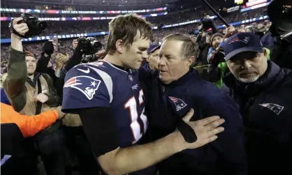  ??  ?? Tom Brady hugs Bill Belichick after the AFC championsh­ip game against the Jacksonvil­le Jaguars. Brady is an NFL free agent for the first time in his career. Photograph: David J Phillip/AP