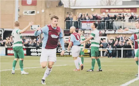  ??  ?? Defender Dillon Morse races away to celebrate putting South Shields 3-0 up against Newport Pagnell. Picture by Peter Talbot