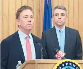  ?? KEATING/HARTFORD COURANT CHRISTOPHE­R ?? Gov. Ned Lamont and Josh Geballe, commission­er of the Department of Administra­tive Services.