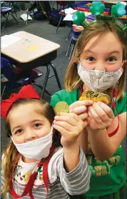  ?? PHOTO SUBMITTED ?? St. Mary School celebrated St. Patrick’s day by honoring the Saint and wearing green. Some classes used our creative thinking and stem skills to construct leprechaun traps or homes. Students found some gold coins or pots of gold as rewards.