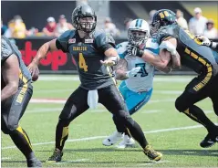  ?? PETER POWER THE CANADIAN PRESS ?? Zach Collaros gets set to throw on Sept. 7, 2015.