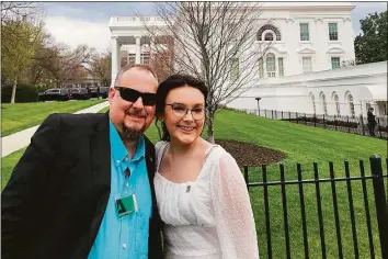  ?? Associated Press ?? In a photo provided by Jeff Walker, he and his daughter Harleigh of Auburn, Ala., stand outside the White House on March 31, where they were guests for Transgende­r Day of Visibility. The family is fighting legislatio­n in Alabama that would outlaw puberty blockers and hormone treatments for trans youth under 19.