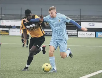  ?? PICTURES BY JOHN LINES ?? Harvey Sparks in action against top-of-the-table Cray Wanderers on Saturday