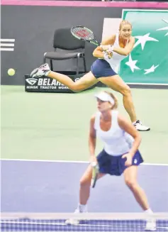  ??  ?? Coco Vandeweghe (front) and Shelby Rogers of the US in action against Aryna Sabalenka and Aliaksandr­a Sasnovich of Belarus. during the Fed Cup Final at Chizhovka Arena in Minsk, Belarus. — Reuters photo