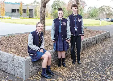  ??  ?? Enjoying being back at school and seeing their friends and teachers again at St Paul’s Anglican Grammar School in Warragul after the COVID-19 lockdown are year 12 students, from left, Stacie Myers, Sophie Kovac and Max L’Hotellier.