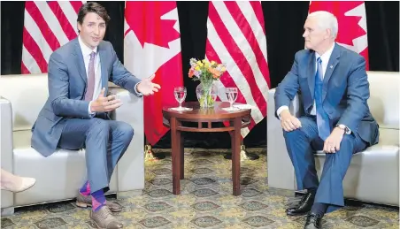  ??  ?? Prime Minister Justin Trudeau meets with U.S. Vice-President Mike Pence on Friday in Providence, Rhode Island.