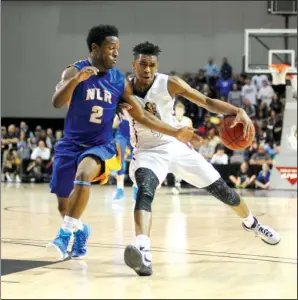  ?? The Sentinel-Record/Mara Kuhn ?? SIGNING DAY: North Little Rock’s Kevaughn Allen, left, defends against Bentonvill­e’s Malik Monk in last season’s Arkansas Class 7A championsh­ip game at Bank of the Ozarks Arena, North Little Rock winning 66-59. An incoming senior ranked among the...