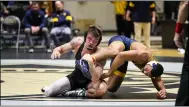  ?? COURTESY J.T. BROWN ?? J.T. Brown was 18-7at 197pounds for the Army wrestling team this season.