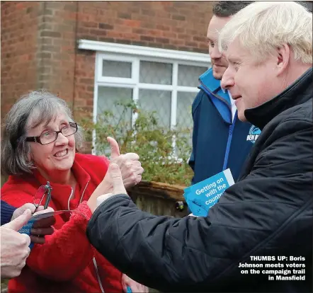  ??  ?? THUMBS UP: Boris Johnson meets voters on the campaign trail in Mansfield