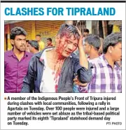  ??  ?? A member of the Indigenous People’s Front of Tripura injured during clashes with local communitie­s, following a rally in Agartala on Tuesday. Over 100 people were injured and a large number of vehicles were set ablaze as the tribal-based political...