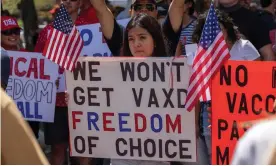  ?? Photograph: David McNew/AFP/Getty Images ?? Anti-vaccinatio­n protesters in Los Angeles.