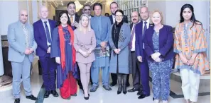  ??  ?? Sara Britcliffe (front, fourth from left) and James Daly (back right) met dignitarie­s including Pakistan PM Imran Khan (centre) on Kashmir visit