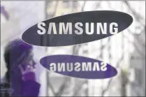  ?? AP 2013 ?? The Supreme Court on Tuesday sided with Samsung in its patent dispute with Apple. The justices said Samsung may not be required to pay all the profits it earned from 11 phone models because the features at issue are only a tiny part of the devices.