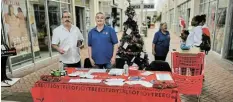  ?? ?? SPREADING JOY: Our 12th Tree of Joy project which ran at Rosehill Mall from December 10-17 saw the public choose recipient cards and purchase gifts for needy children or elderly people.