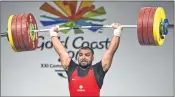  ??  ?? India’s Pradeep Singh during the 105kg weightlift­ing final.