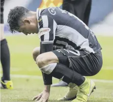  ??  ?? 0 St Mirren’s Jamie Mcgrath is left dejected at full-time