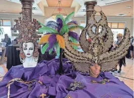  ?? PHOTOS BY CAROLE STEPHEN-SMITH ?? The stunning entry piece at the GFWC Woman's Club of Indio's annual fundraiser, reflecting the Mardi Gras theme.