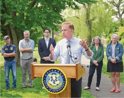  ?? Tyler Sizemore/Hearst Connecticu­t Media ?? Gov. Ned Lamont speaks about the proposed trail connecting Stamford’s Boccuzzi Park to Greenwich’s Binney Park at Binney Park on Monday. The new two-mile trail is in the works thanks to a $270,000 grant from the state.