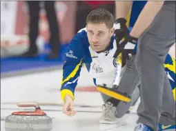  ?? The Canadian Press ?? British Columbia skip John Morris delivers a rock during the Tim Horton’s Brier in St. John’s on the weekend. Morris and the Vernon-Kelowna team of Jim Cotter, Tyrel Griffith, Rick Sawatsky, David Harper and Jody Epp (coach) are at 1-2 after winning their first game on Sunday afternoon, 8-3 over New Brunswick.