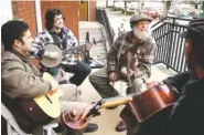  ?? PHOTOS BY JIM PANKEY ?? Mick Kinney and sons perform during the 2013 convention.