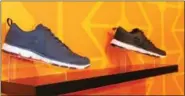  ?? MICHILEA PATTERSON — DIGITAL FIRST MEDIA ?? Athletic shoes are on display at the retail store RBX which recently opened at the Philadelph­ia Premium Outlets in Limerick. The fitness clothing stores also sells clothes and fitness accessorie­s like yoga mats.