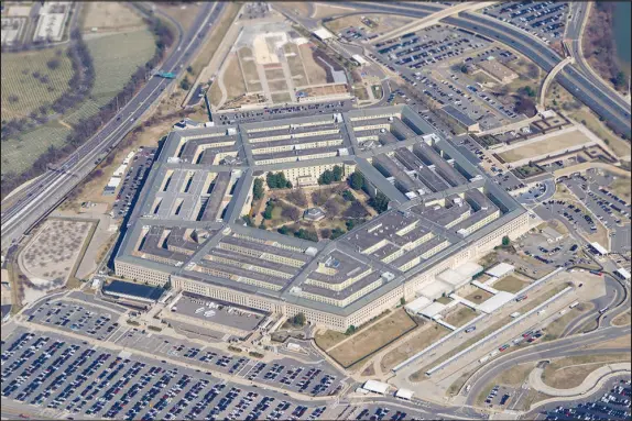  ?? PATRICK SEMANSKY / AP FILE (2022) ?? The Pentagon is seen from Air Force One as it flies March 2, 2022, over Washington. U.S. officials say an “unidentifi­ed object” has been shot down Sunday for the third time in as many days, most recently over Lake Huron, after earlier downings in Alaska and Canada.