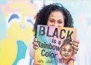  ??  ?? Seeing the lack of diversity in children’s books, Angela Joy felt a responsibi­lity to write the book, “Black Is a Rainbow Color.”