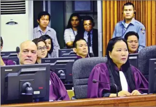  ?? ECCC ?? Internatio­nal Co-Prosecutor Nicholas Koumjian (left) and his national counterpar­t, Chea Leang, differed on whether suspect Ao An should be tried in summaries of submission­s yesterday.