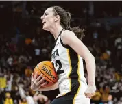  ?? Abbie Parr/Associated Press ?? Iowa’s Caitlin Clark celebrates as time expires during an overtime win over Nebraska in the final of the Big Ten tournament.