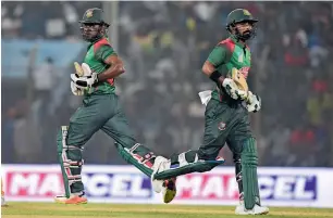  ?? AFP ?? Bangladesh’s Imrul Kayes (right) and Liton Das run between wickets during the second ODI at the Zahur Ahmed Chowdhury Stadium in Chittagong on Wednesday. —