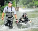  ??  ?? Clockwise from top: Texas National Guard soldiers aid residents in heavily flooded areas of the state; A woman carries her dog as she evacuates her home in Houston; People evacuate a neighbourh­ood in west Houston.