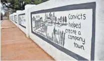  ?? MONICA RHOR/ USA TODAY ?? A painting on a bridge in Sugar Land notes the contributi­on of convicts but doesn’t mention the forced labor of black prisoners in the convict leasing system.