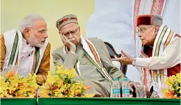  ?? — PTI ?? Prime Minister Narendra Modi with BJP leaders L.K. Advani and M.M. Joshi at the inaugurati­on of the BJP headquarte­rs, in New Delhi on Sunday.
