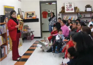  ??  ?? Maribel Cruz, a bilingual parent educator with the Batesville School District, is shown speaking about child safety at a parent group meeting.